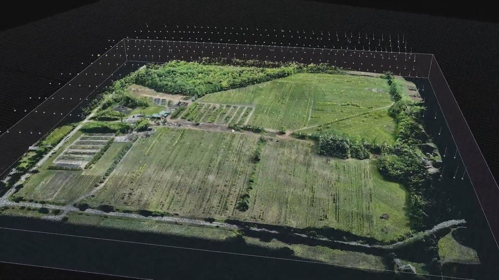 Drone photogrammetry model of a farm property and the terrain around it
